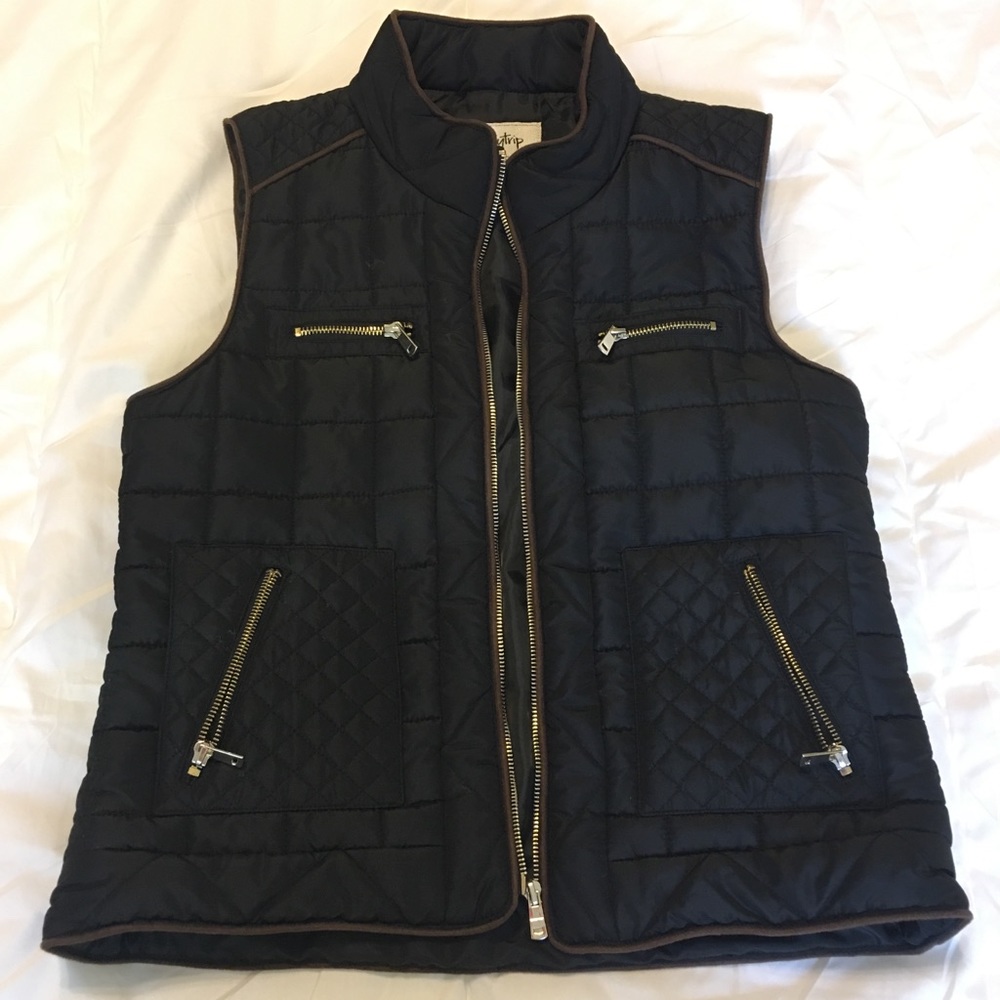 Day trip puffer vest with gold zippers